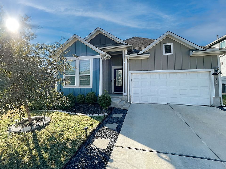 Front of house, 2 car garage