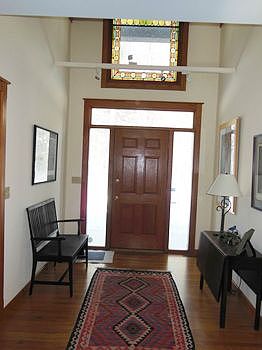 This vaulted entry is bright and spacious.  Plenty of room to welcome those you love to entertain.