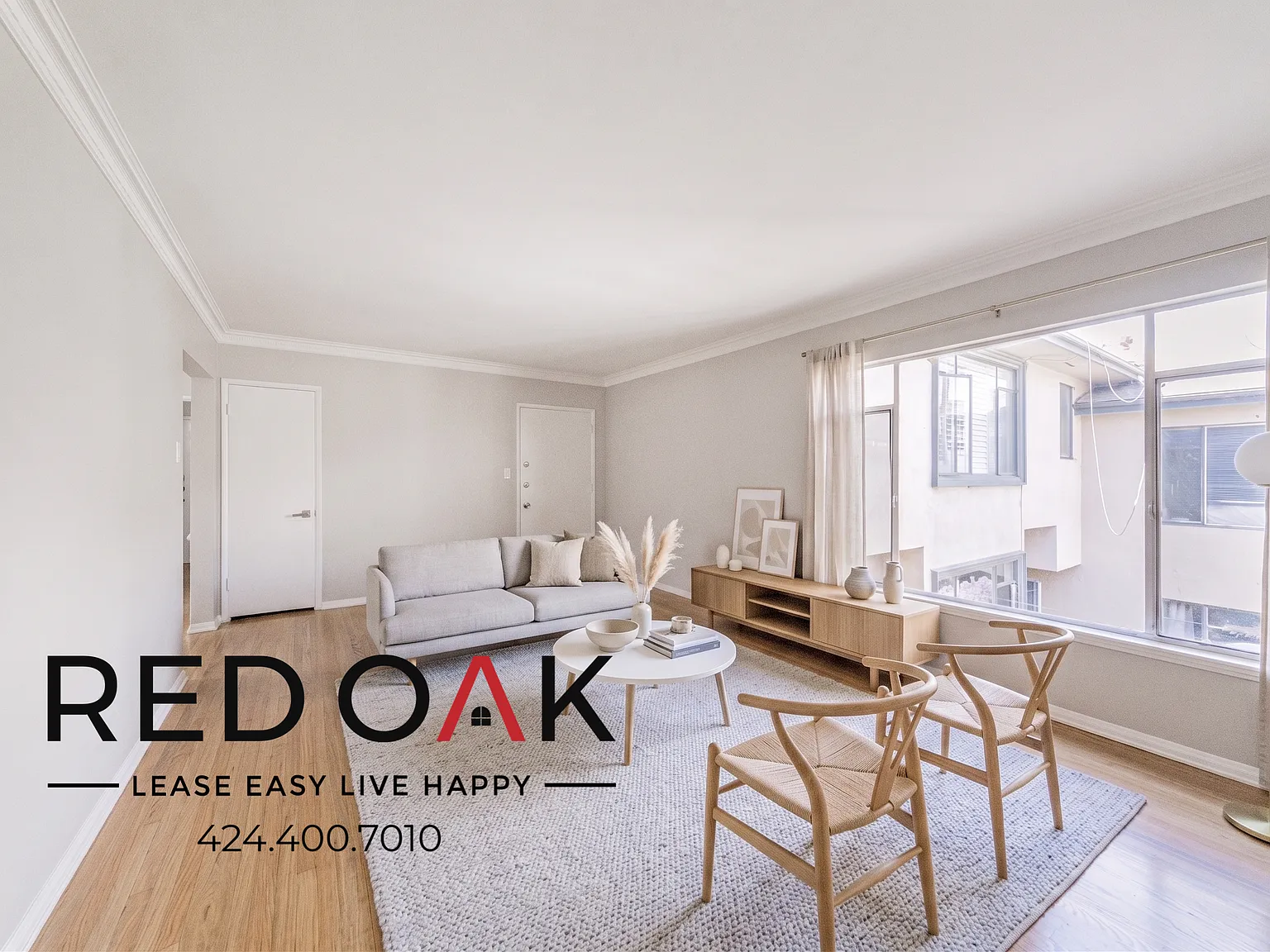 ~1 Month FREE~ Cheerful Two Bedroom with Lots of Natural Light, On-Site Laundry, and Parking Incl... — Photo 1