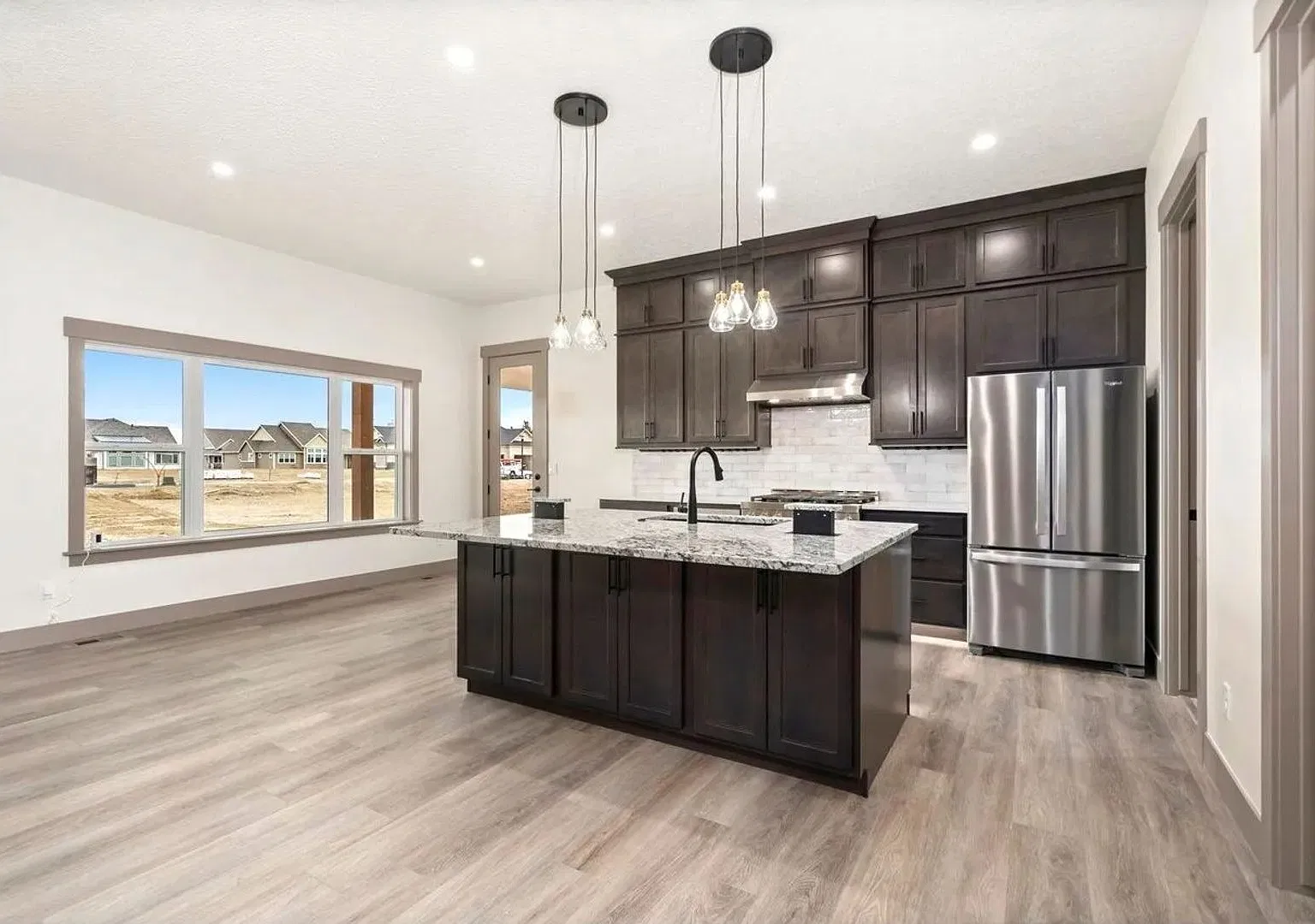 Stunning 5-Bedroom Ranch Home with Sunroom & Oversized 4-Car Garage in Berthoud! — Photo 3