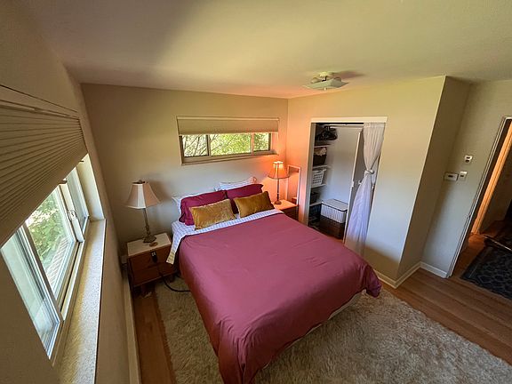 Master bed, with queen mattress. This bed is electric adjustable. Room darkening shades.