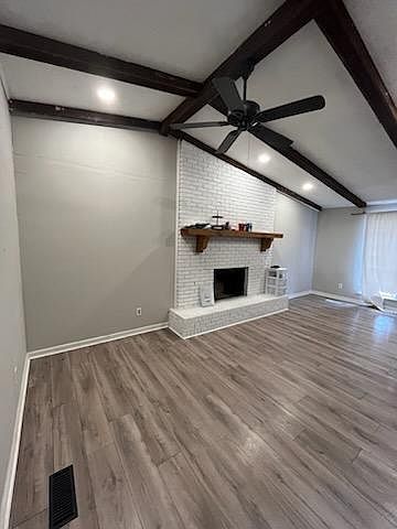 Living room, high ceilings and fireplace