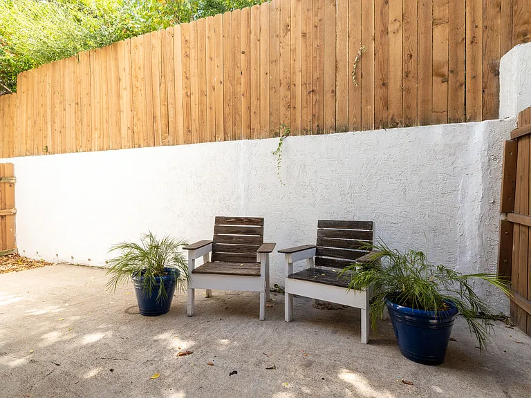 Enjoy morning coffee or a drink to unwind on this patio.