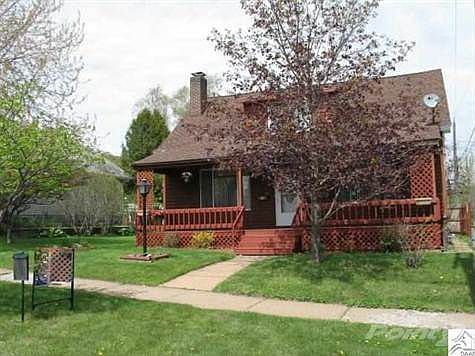 Vinyl & Wood Sided.  Newer Roof!