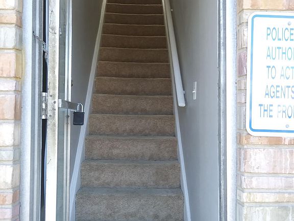 Stairs going to apartment that it's on second floor. 