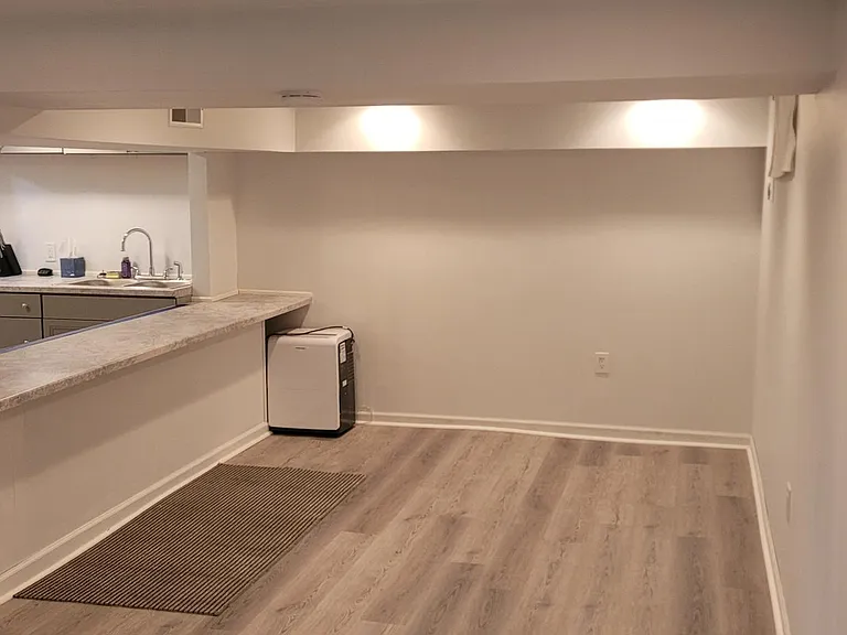 POSSIBLE MOVIE ROOM, WORKOUT ROOM, FAMILY ROOM OR STORAGEROOM and bedroom.