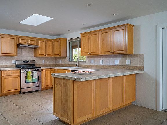 Large bright kitchen w/views