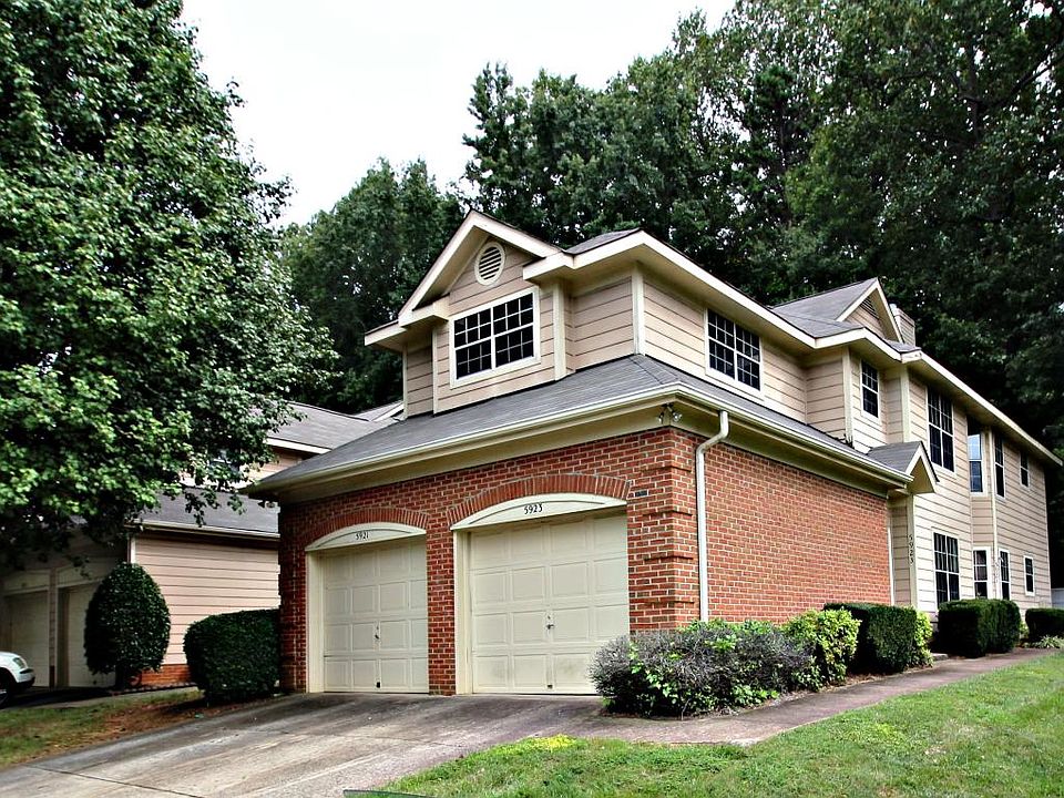 Duplex building each with 1 car garage