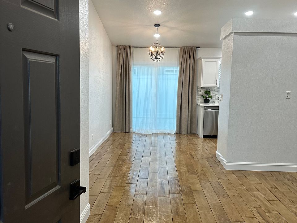 New wood-plank style tile flooring