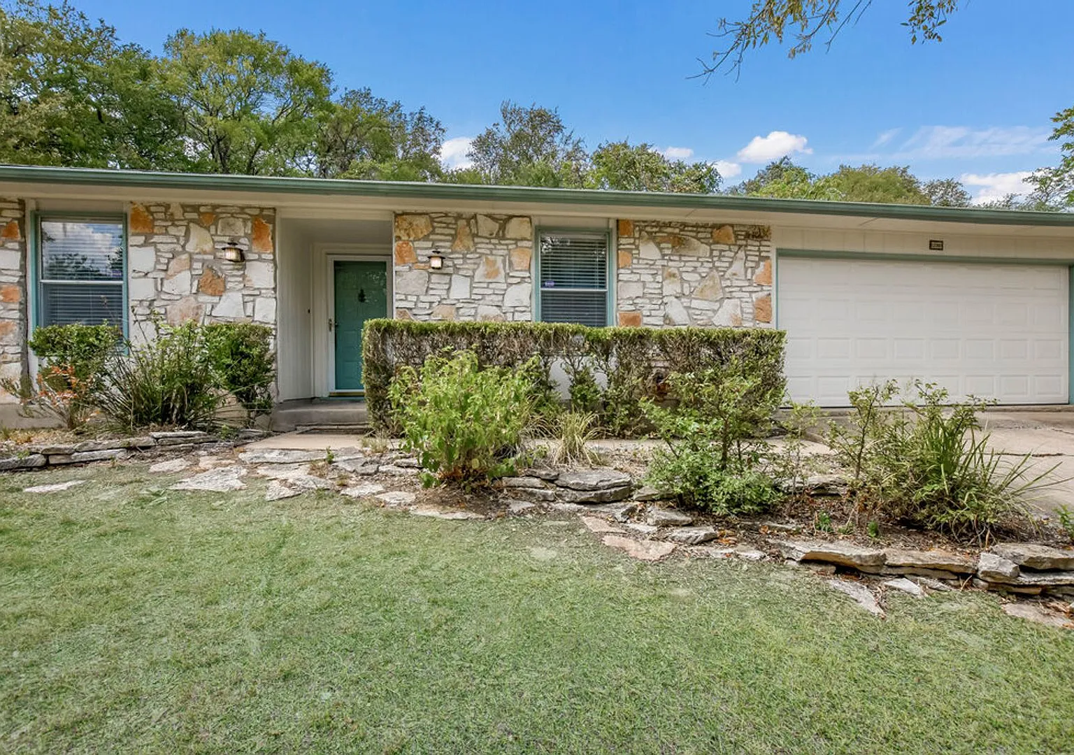 North Austin Gem with Wooded Backyard & Two-Car Garage! — Photo 1