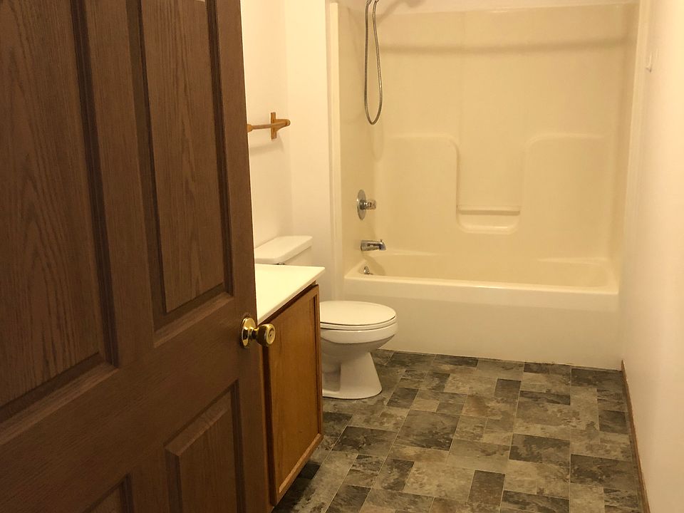 Bathroom with new flooring, and accessable off of hallway.