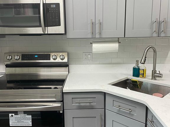 The Kitchen- Entirely renovated- New appliances with new cabinet & countertop