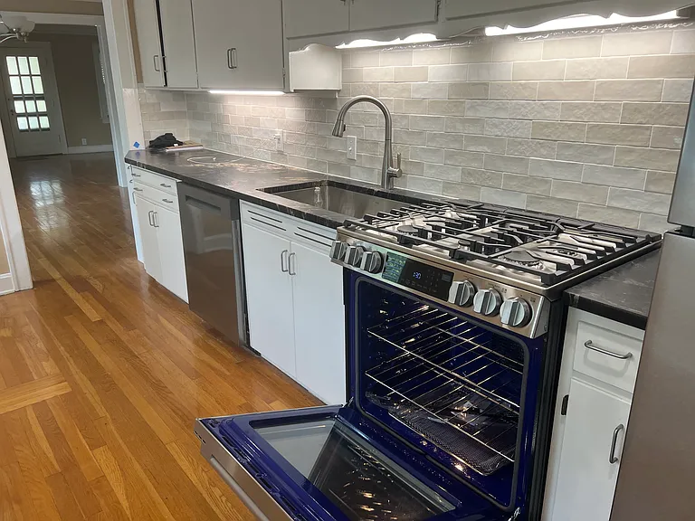 Stove and cabinets with under mount lights