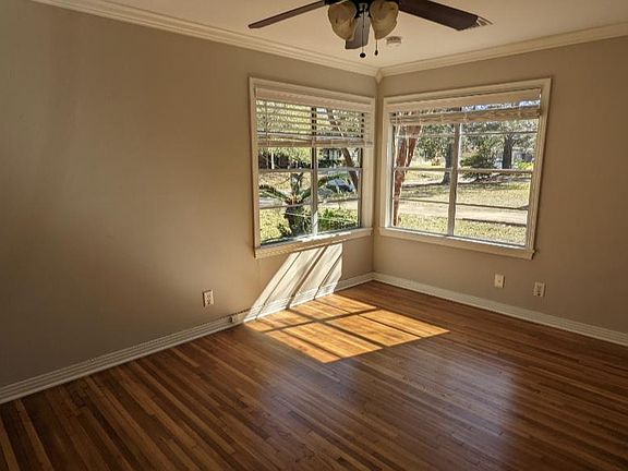 Sunny bedrooms with original hardwood floors