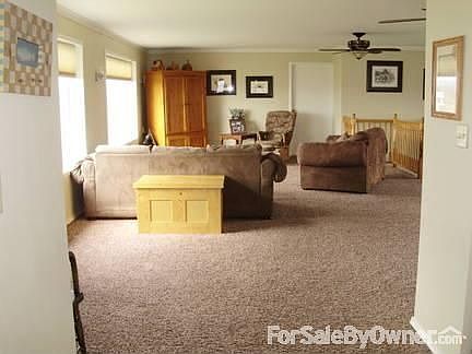 Living Room : Living room is open and very spacious with 3 huge bay window for beautiful views