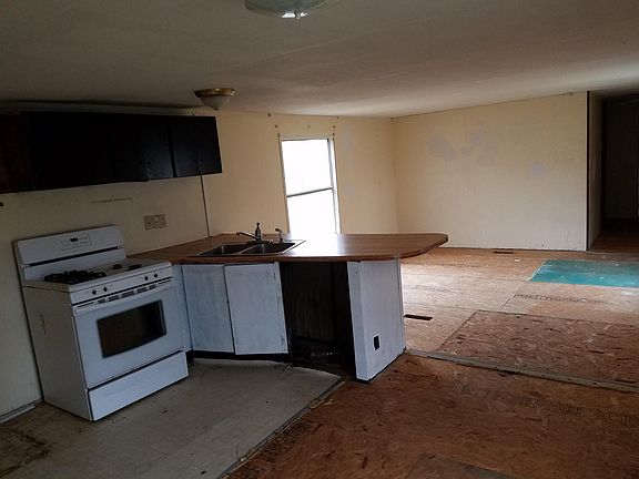 big kitchin, needs flooring.