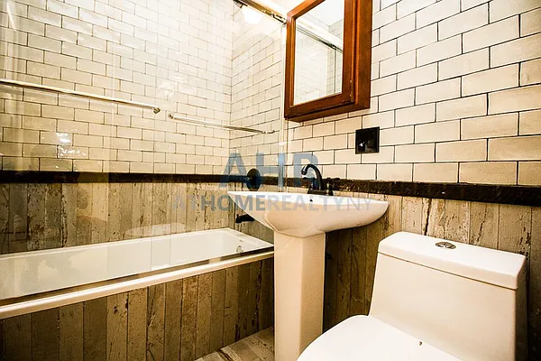 Rented by At Home Realty NY LLC | media 49