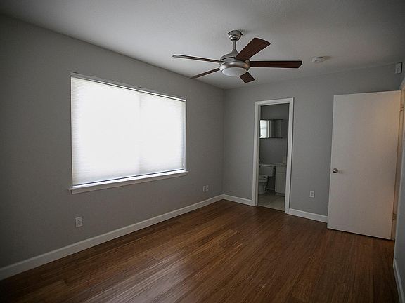 Bedroom with en suite half bath