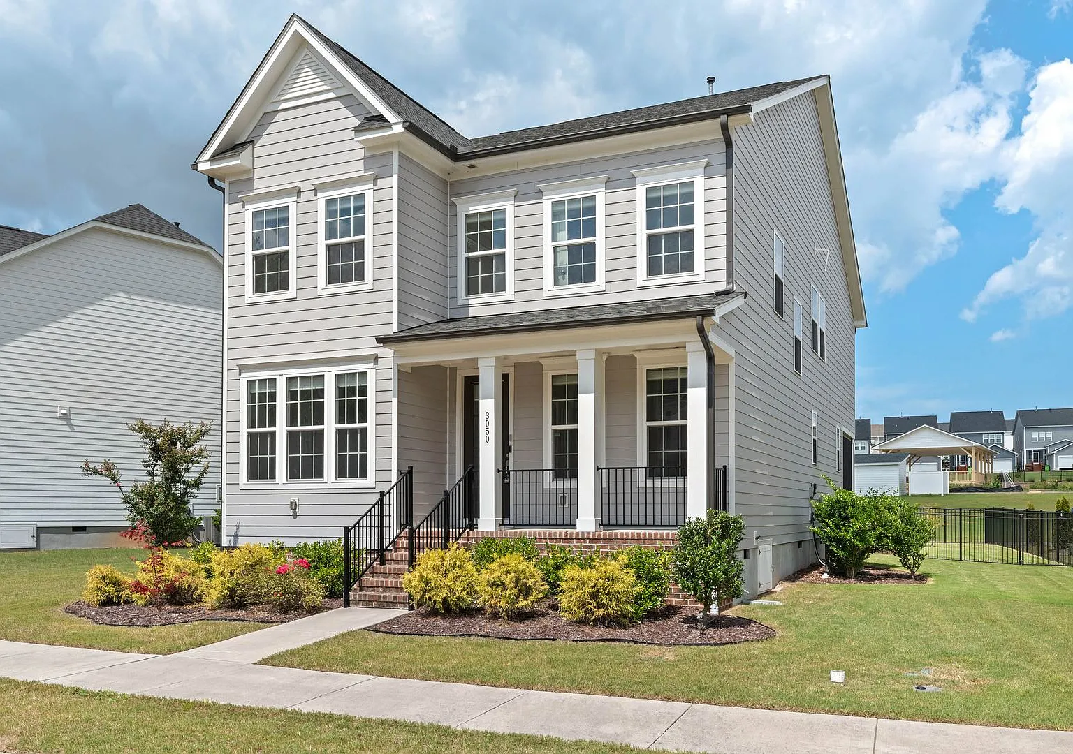 Prized location+ Modern 4 bed 3 bath Home Offers Everything You Could Wish for at Smith Farm! — Photo 1