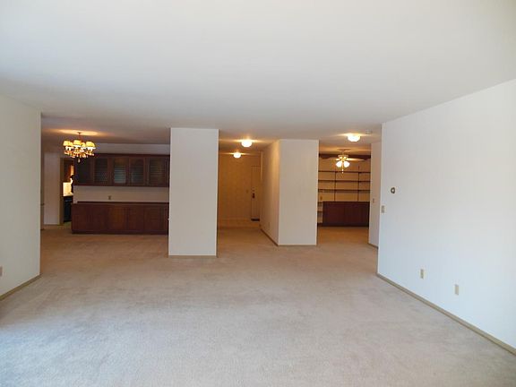 Living Room looking into Dining room and Den