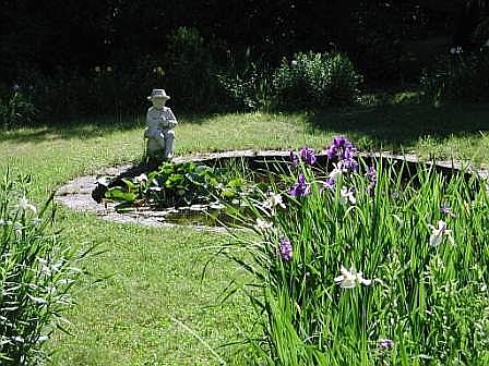 Koi pond  circa 2003 statue 