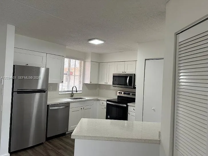 6175 NW 186th St #110 — Photo 9