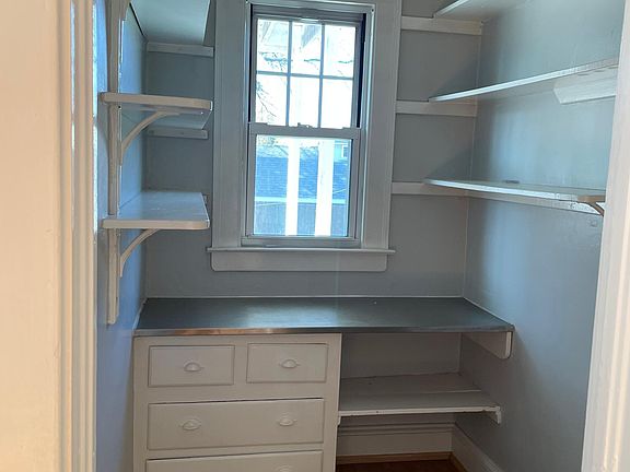 Walk in pantry with plenty of storage.