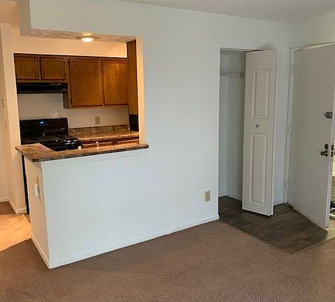 Galley style kitchen- entry coat closet