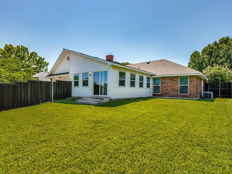 Expansive green lawn providing a substantial outdoor area