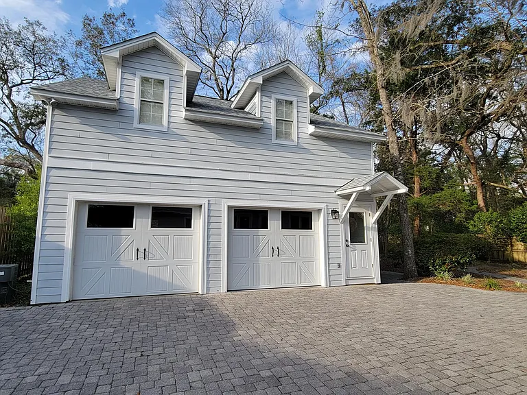 Two 25 Feet Deep Garages with Carriage Apartment Above