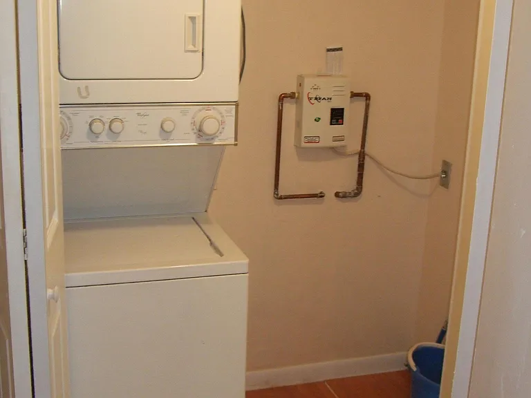 Washer dryer & tankless water heater & room for storage