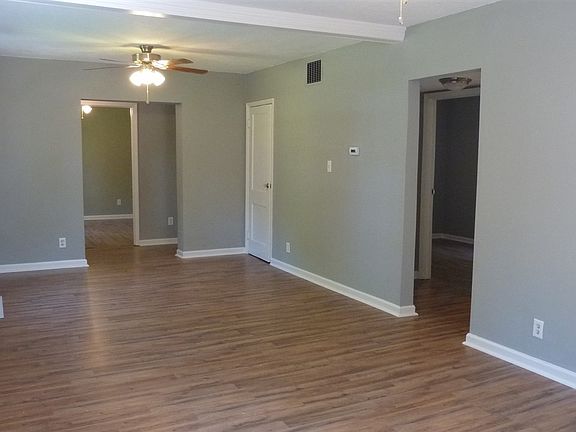 Spacious living room with room for dining area if you would like to split into two sections.