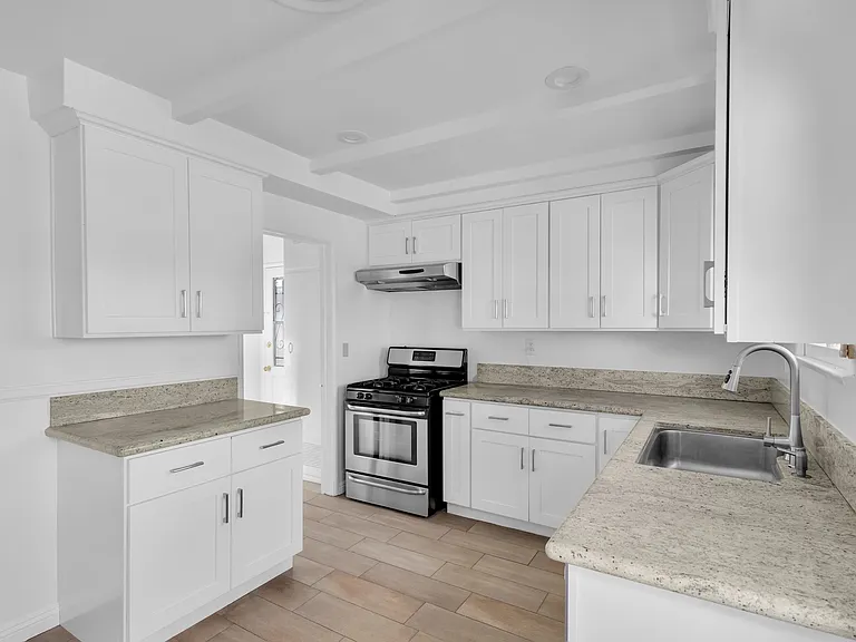 7716 Teesdale Ave — Photo 9