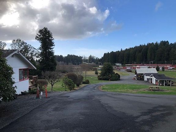 View of the property looking towards the road. The house is on the left.