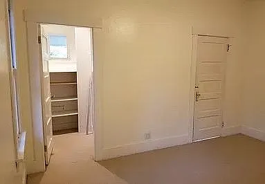 Second upstairs bedroom, with views to views to both front and side yards