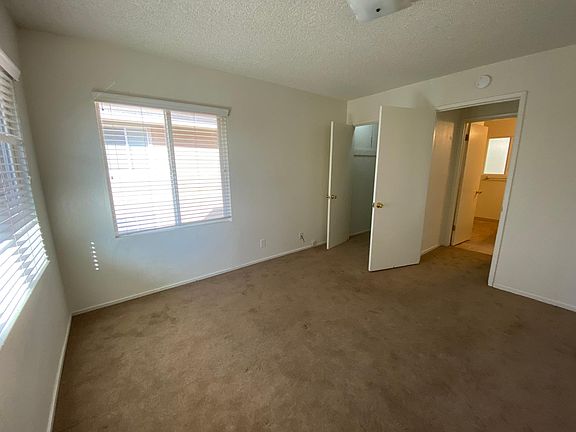 Bedroom with walk-in closet