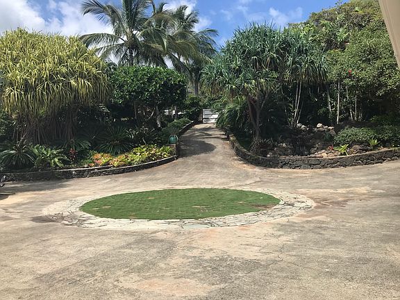 Turn right at the bend as you approach the lawn circle.