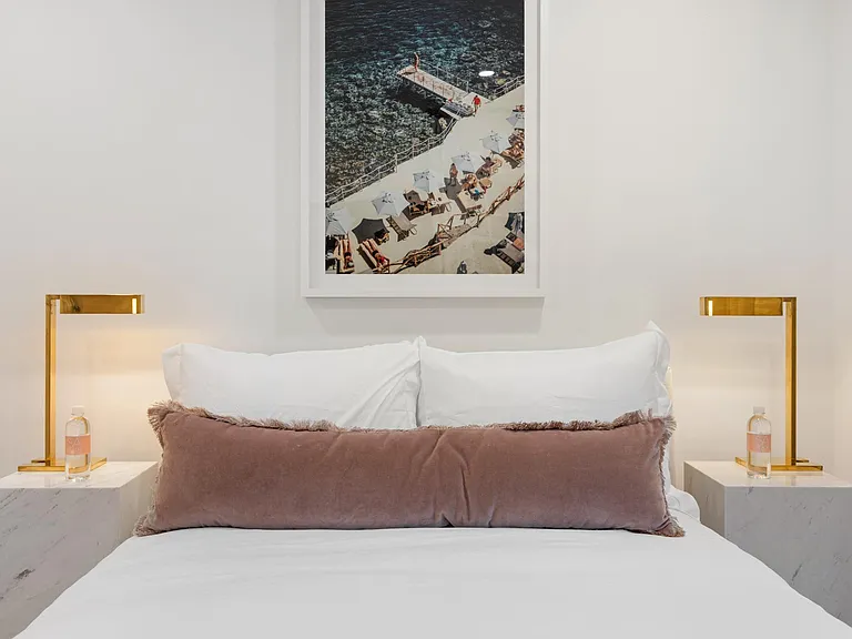 Experience redefined elegance in this bedroom, adorned with luxurious design touches.