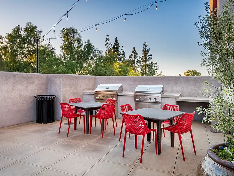 The Harrington barbecue area and outdoor dining tables