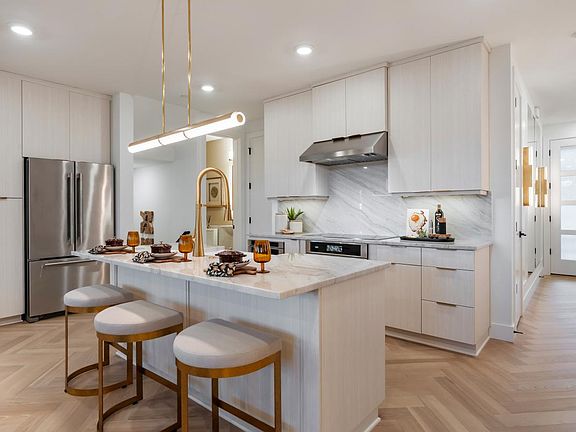 Representative Photo - Well-appointed kitchen with ample storage space