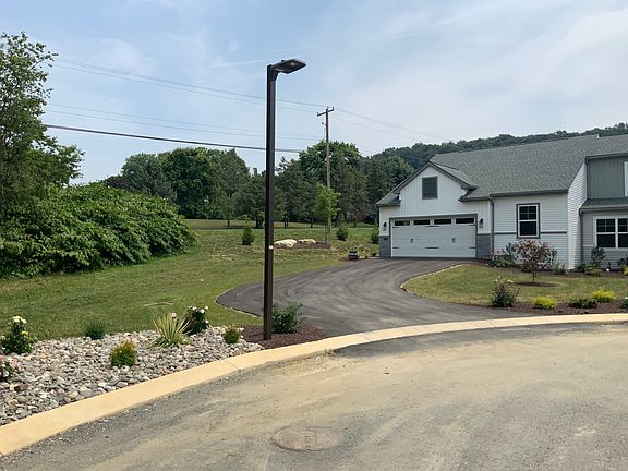 Driveway provides extra parking.