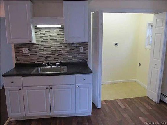 Kitchen with Washer-Dryer hookups in closet