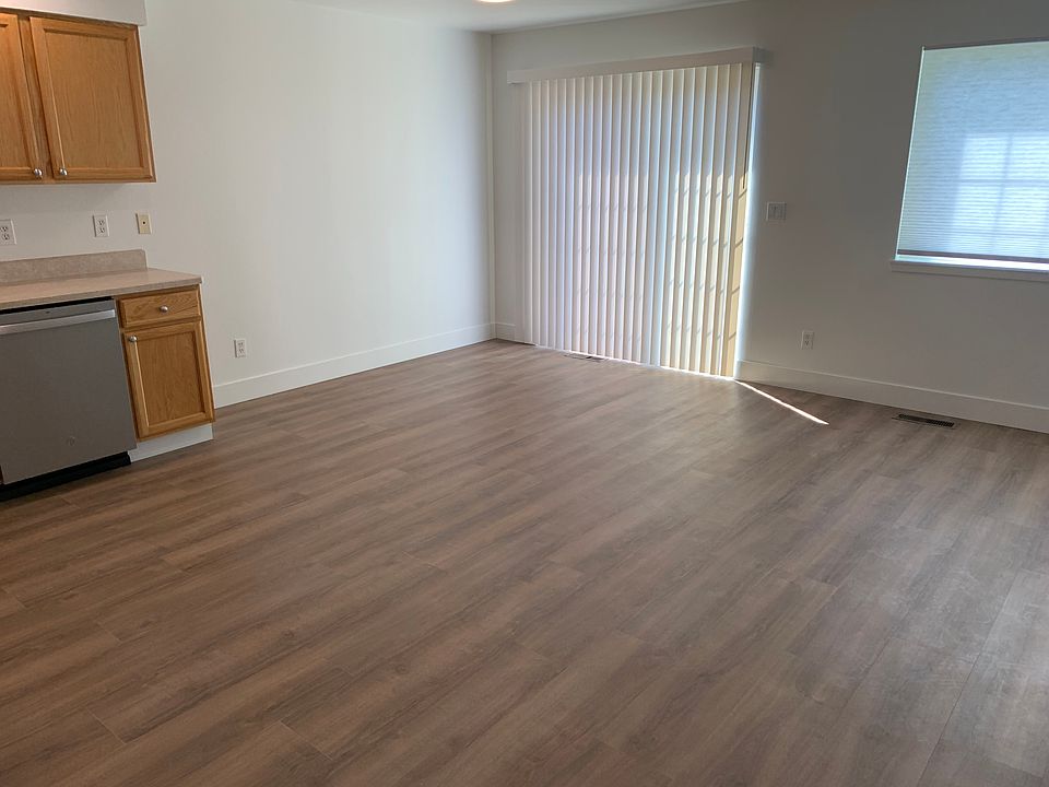 Main area with sliding patio door to fenced backyard.