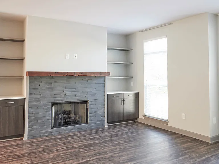 Living Room with Fireplace and Hard Surface Flooring