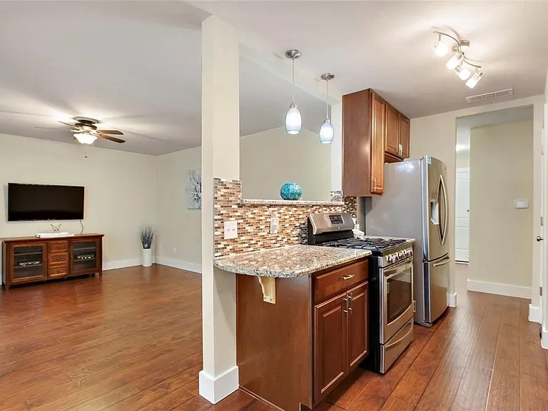 6101 Harwin Ln — Photo 3