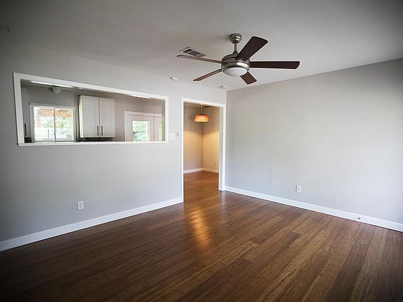 Living room looking toward kitchen/dining