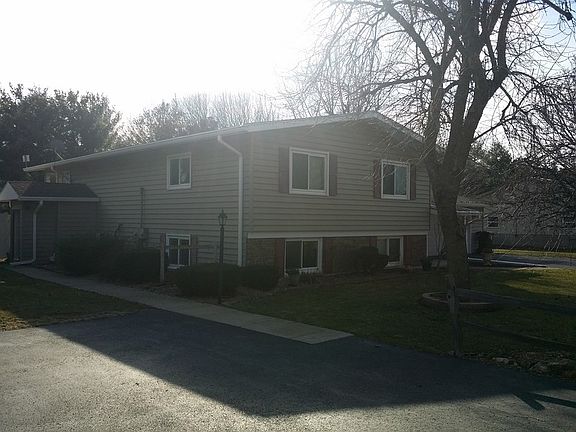 Exterior : Exterior showing entrance to office and side paved driveway.