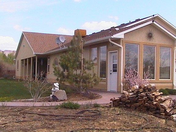 sun room and backyard from garden area