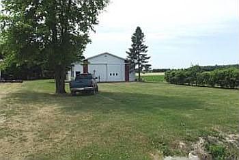 The 44x64 Pole Barn is every man's dream. The Pole Barn features a concrete floor, 220 electric, and an office areaworkroom.
