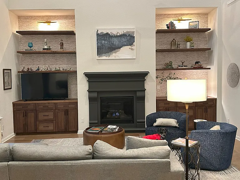 Living Room with fireplace and built-in cabinetry.